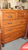 A 2 over 3 mahogany chest of drawers.