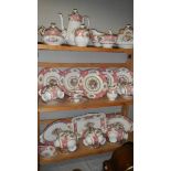 61 pieces of Royal Albert Lady Carlyle tea and coffee ware including teapot, coffee pot, milk jugs,