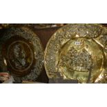 A large pair of brass wall plaques. and a copper tray.