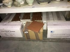 9 boxes of clay floor tiles
