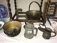 A collection of metalware jam pots, irons, tankards etc.