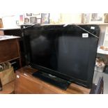 A 31" Sharp flat screen TV