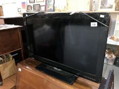 A 31" Sharp flat screen TV