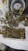 A mixed lot of brassware including figures, key's, miniature Miner's lamps. taps etc.