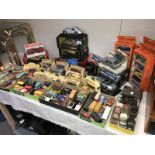 A collection of boxed & unboxed diecast cars