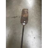 A long bakers oven shovel