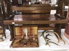 A copper sheet topped wood coffee table