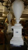 A pair of tall alabaster table lamps. a/f.