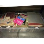 A box of assorted books & maps