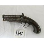 An early 18th century Queen Ann cannon barrel pistol, in good condition.