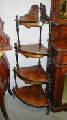 A superb quality Victorian mahogany inlaid corner what not with graduated shelves.