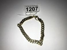 A 14k (585) gold bracelet, approximately 29 grams.