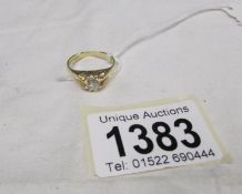 An 18ct gold ring (H.M Sheffield 1990) set with 0.