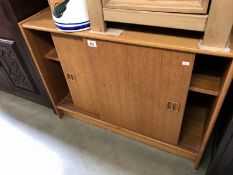 A small sliding door cabinet