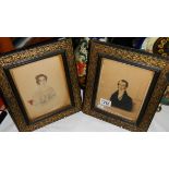 A pair of framed and glazed portraits of a lady and gentleman.