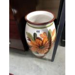 An 18" modern vase with abstract flower decoration