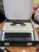 A cased underwood 315 compact typewriter