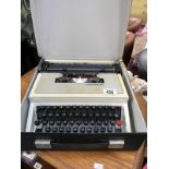 A cased underwood 315 compact typewriter