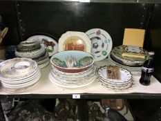 A large quantity of collectors plates