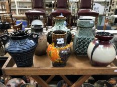 8 assorted west Germany pottery jugs