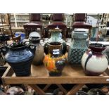 8 assorted west Germany pottery jugs