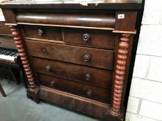 A Scottish chest of drawers with barley twist pillars