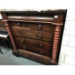 A Scottish chest of drawers with barley twist pillars