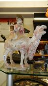 A Tang Dynasty camel and rider, 618-906 AD.