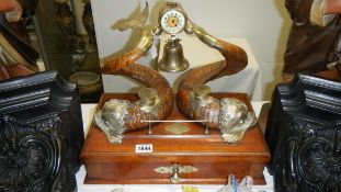 A magnificent oak desk stand with mythical fish in horn and metal, brass bell and clock.