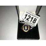 A 10ct/10g Gold enamelled U.S.A college ring, size Q.