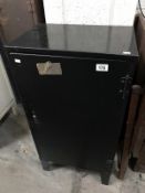 A lockable metal cabinet