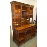 A designer sideboard with pull out writing slope and hinged compartments.