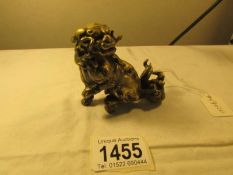 A Chinese bronze? dog of foo.