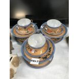 A Japanese egg shell porcelain tea cup set