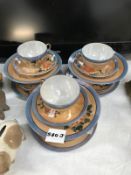 A Japanese egg shell porcelain tea cup set
