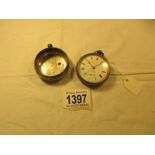 A silver pocket watch and a silver pocket watch case.