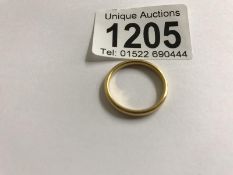 A 22ct gold wedding ring, approximately 3 grams, size P.