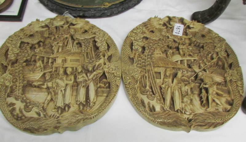 A pair of finely carved 19th century Chinese wall plaque.