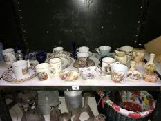 A shelf of mixed porcelain & pottery including Palissy & Crown Staffordshire etc.