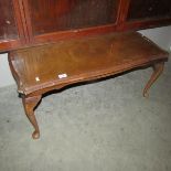 A glass topped coffee table.