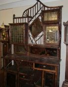 A magnificent bamboo arts and crafts style cabinet/dresser.