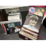 A case & box of 45rpm records