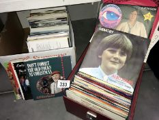 A case & box of 45rpm records