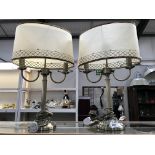 A pair of double table lamps