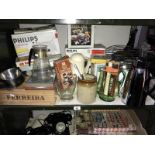 A shelf of kitchenalia