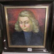 A 1960's British school oil on canvas portrait of a young lady.
