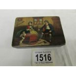 A snuff box with continental scene.