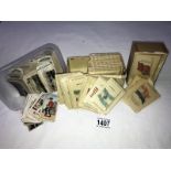 A quantity of cigarette cards and Kensitas silks.