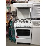 A New World gas cooker with overhead grill