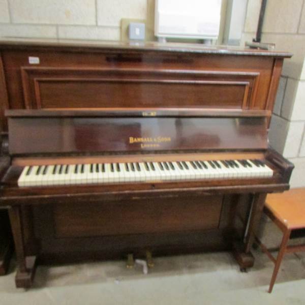 A Bansall & Sons, London upright piano.
